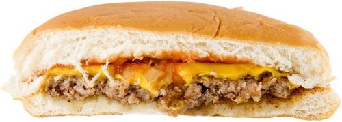 A McDonald's cheeseburger cut in half. 