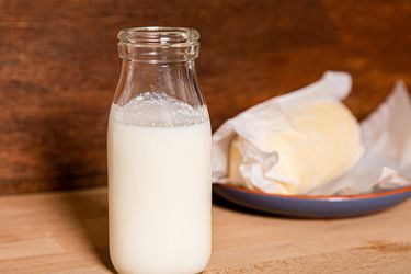 Buttermilk in front of butter