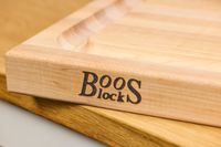 Closeup of a John Boos Reversible Maple Wood Cutting Board with Juice Groove