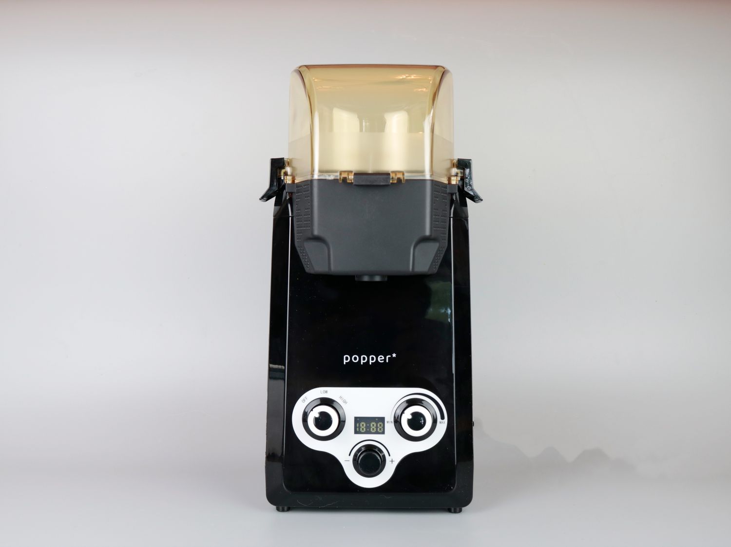 The popper coffee roaster on a white backgroujnd