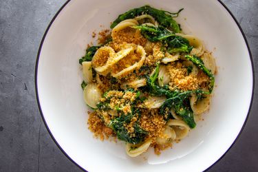 Orecchiette con le Cime di Rapa in a white pasta bowl