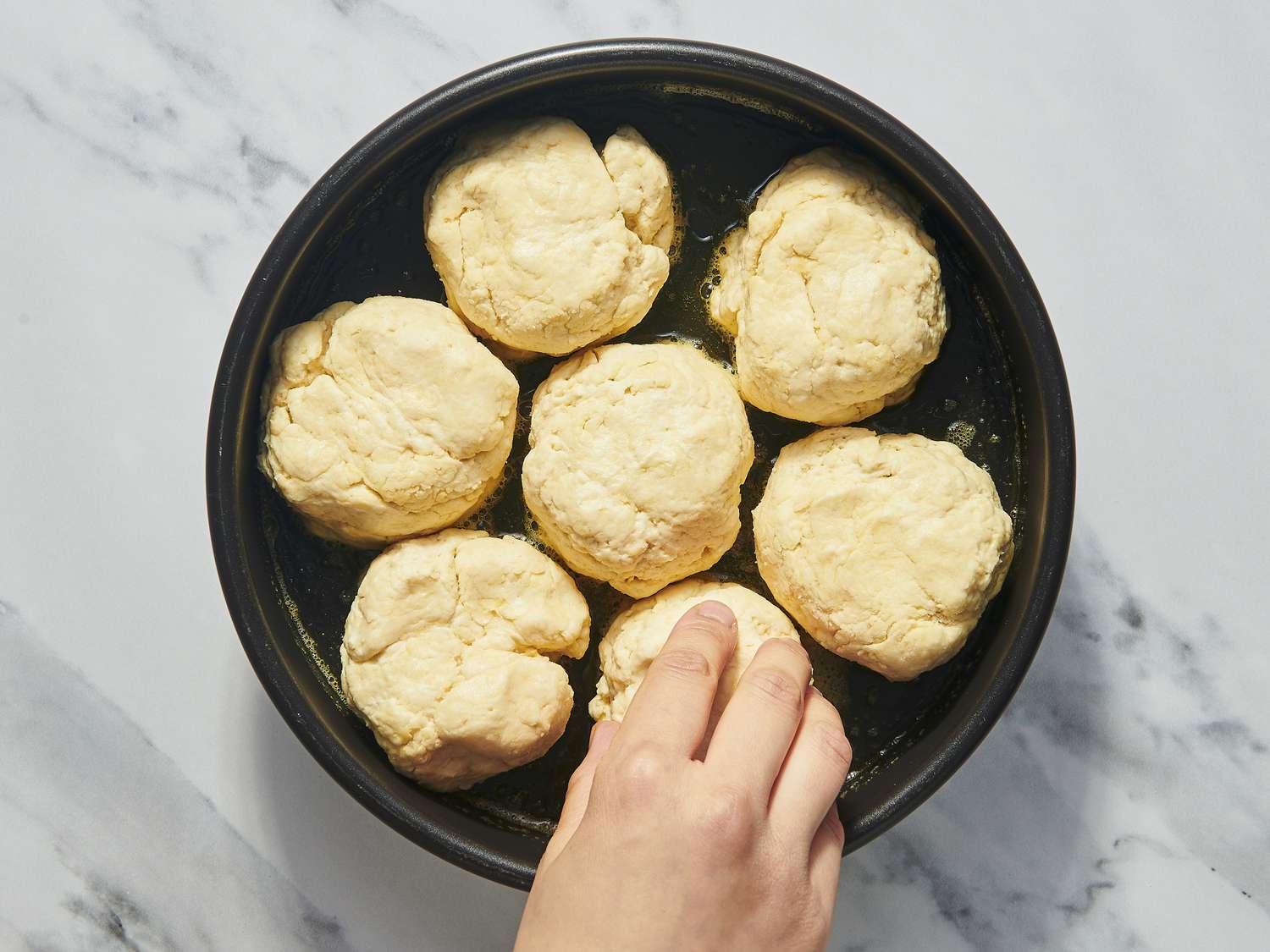 Overhead view of placing into pan