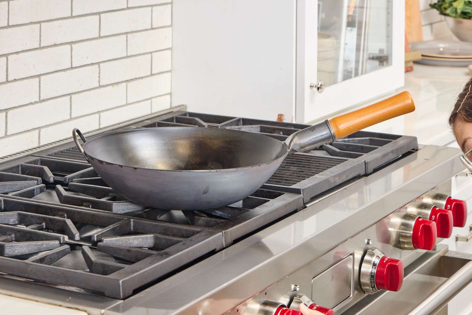 The Yosukata Carbon Steel Wok Pan on a stovetop