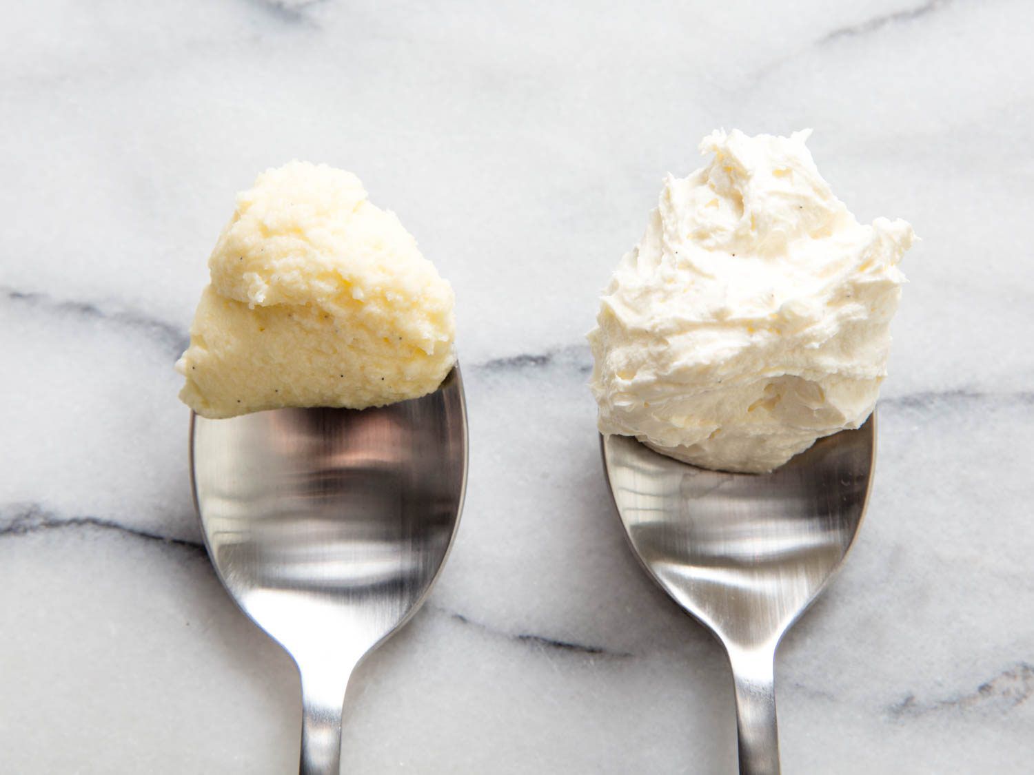 A spoonful of dense, cold buttercream (left) with a final temperature of 65°F (18°C) and a spoonful of light buttercream at the proper temperature (right) with a final temperature of 72°F (22°C).