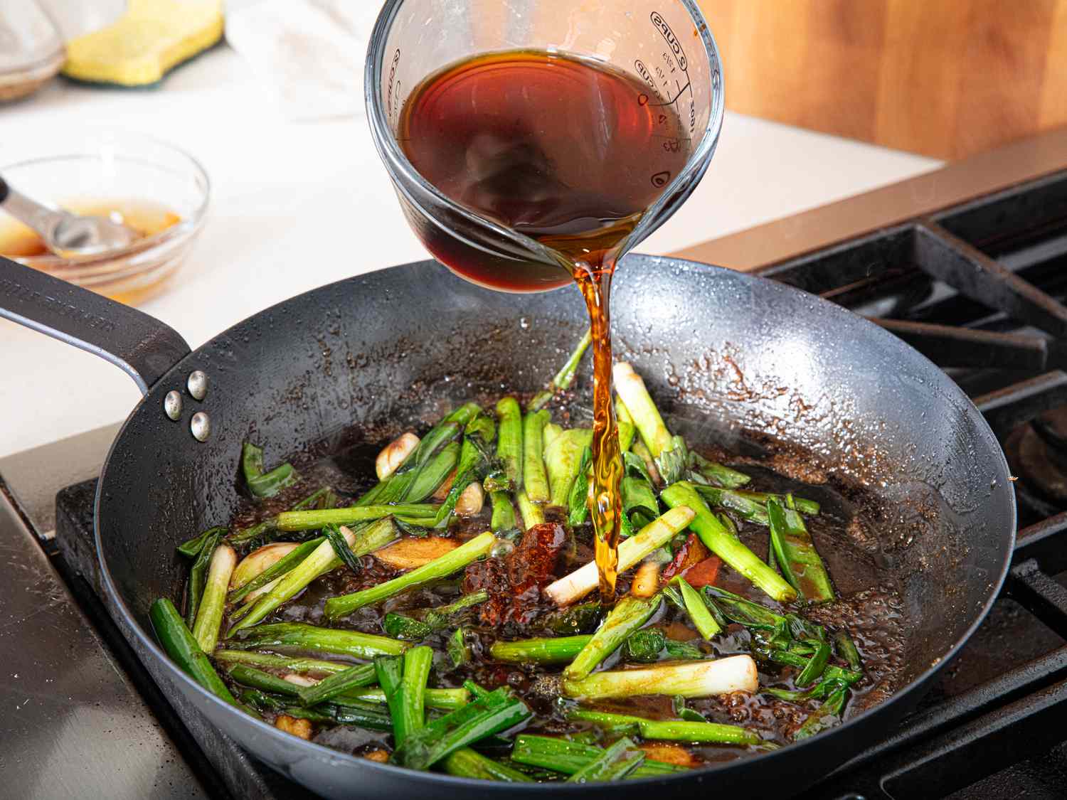 Side view of adding wine