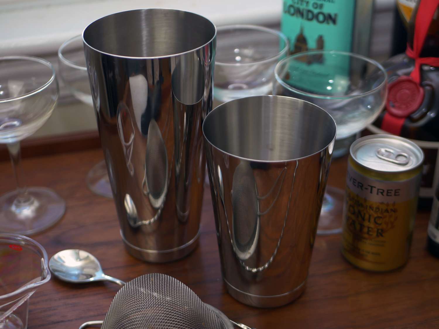 Koriko Boston shakers on a bar cart with other gear and drink staples