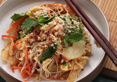 Vietnamese Citrus and Noodle Salad With Fresh Herbs and Fried Yuba, served on a plate.