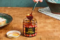 Tasting India Bombay Chili Crunch being scooped