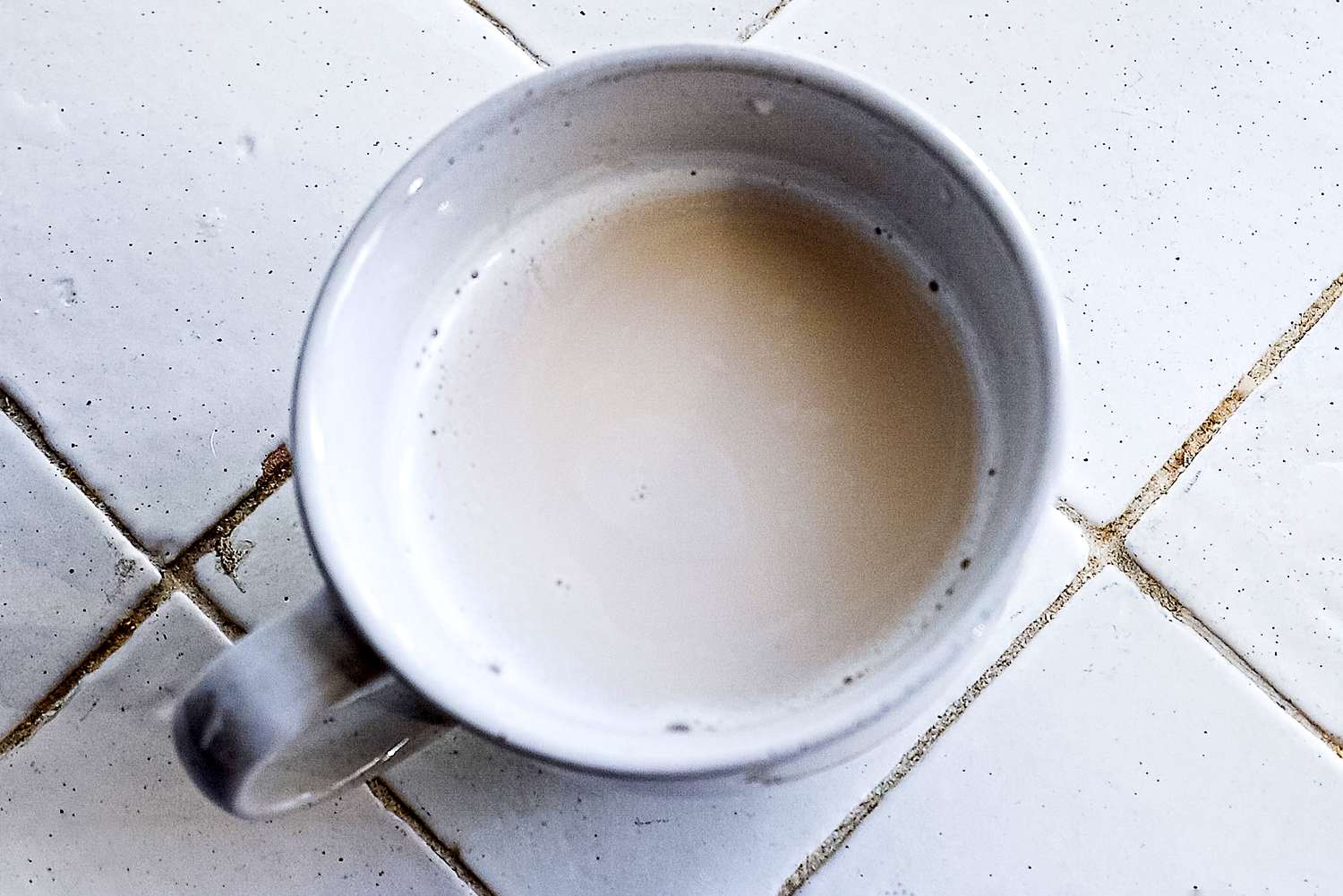 a mug full of nut milk from the alfabot 