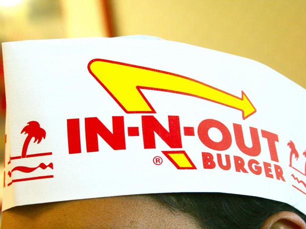 An In-N-Out hat on a person's head