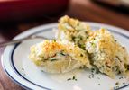 Seafood stuffed shells covered in golden breadcrumbs