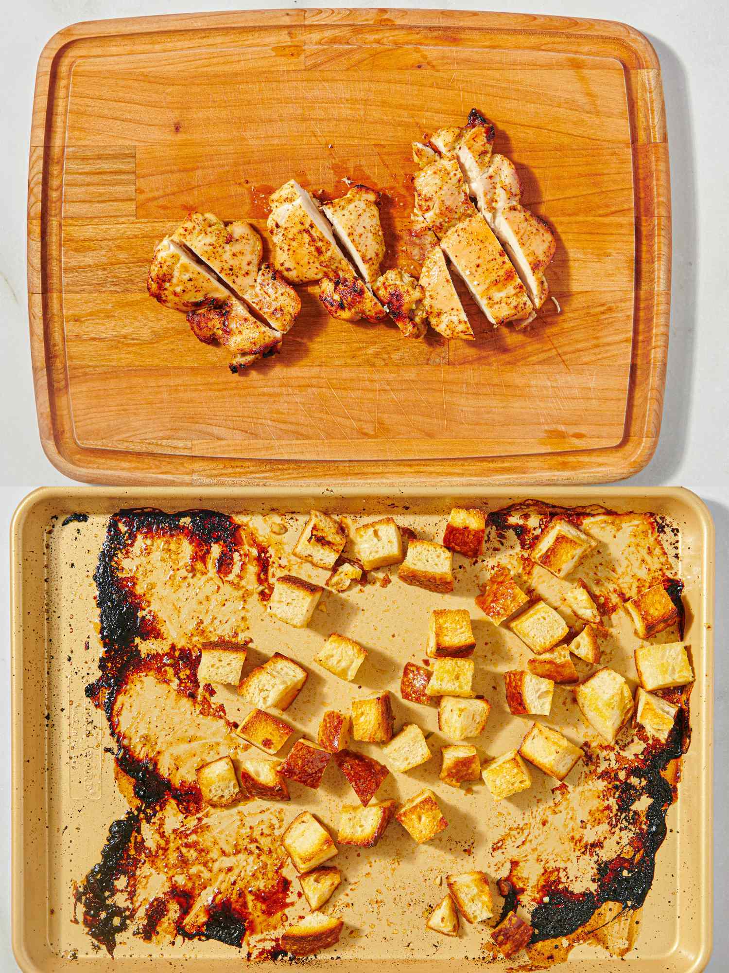 Cooked chicken thighs sliced on a cutting board above roasted vegetables on a baking sheet