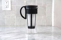 The Hario cold brew maker on a marble kitchen countertop.