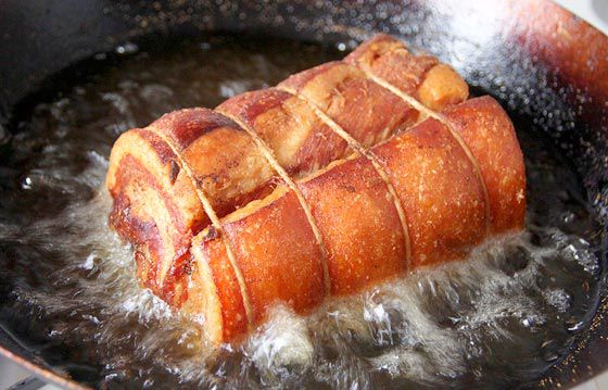 golden fried pork belly porchetta underside exposed