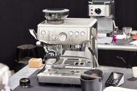 Breville Barista Touch Impress Espresso Machine with Grinder placed on a counter