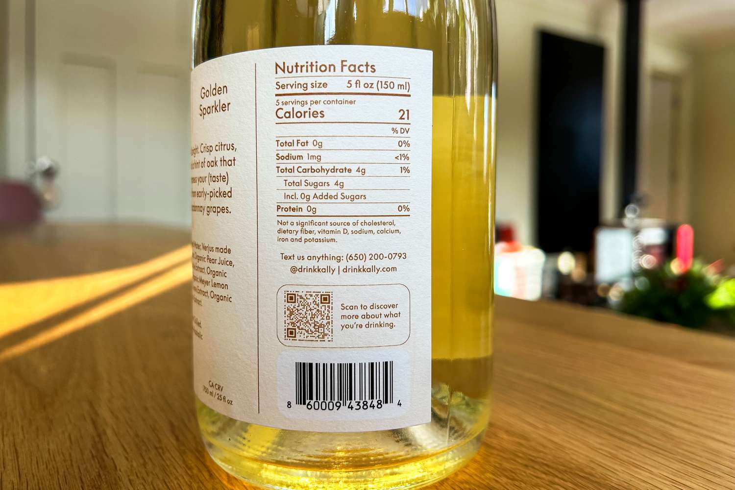 A bottle of Kally nonalcoholic sparkling wine