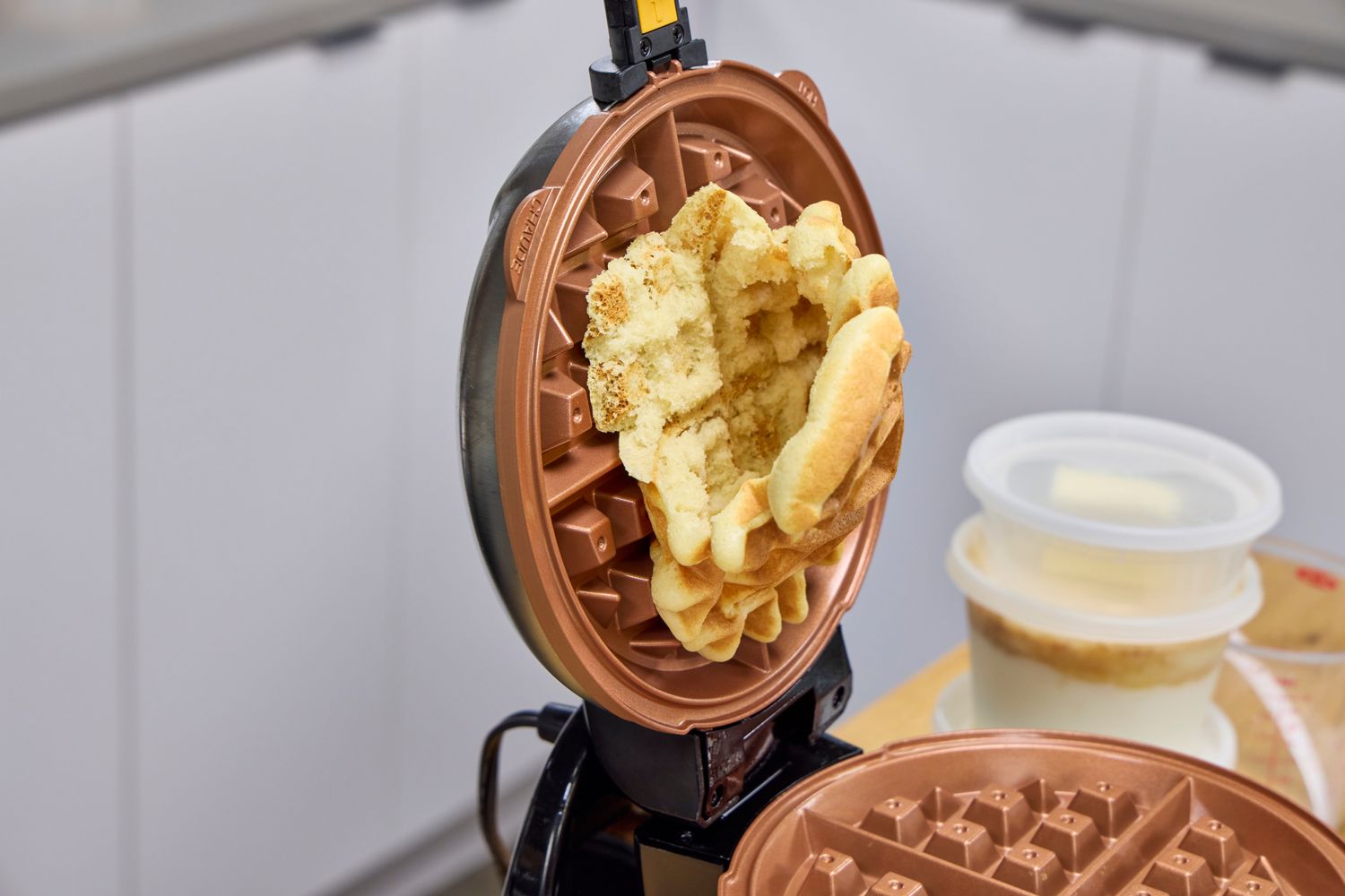 A waffle sticks to the Hamilton Beach 26031 Easy Flip Belgian Waffle Maker plate