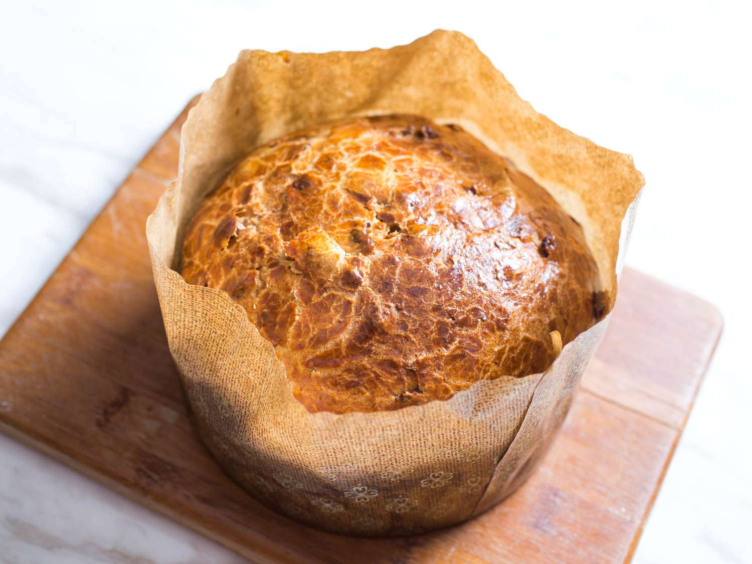 Overhead shot of a loaf of panettone in paper mold