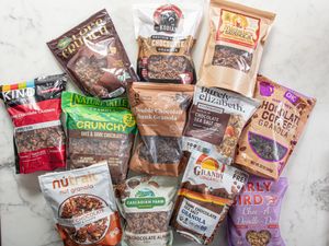 A selection of various chocolate granola brands displayed on a table