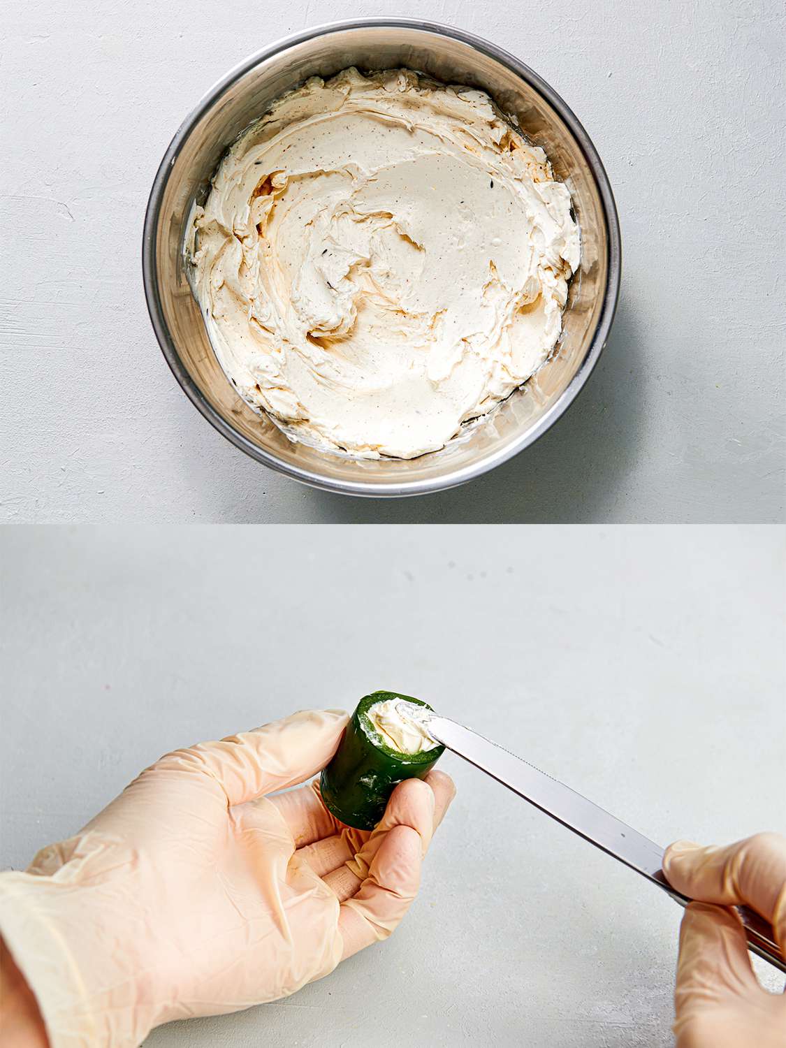 A two-image collage. The top image shows a metal mixing bowl holding the seasoned cream cheese filling, and the bottom image shows a pair of gloved hands filling a hollowed out jalapeÃ±o ring with the filling using a butter knife.