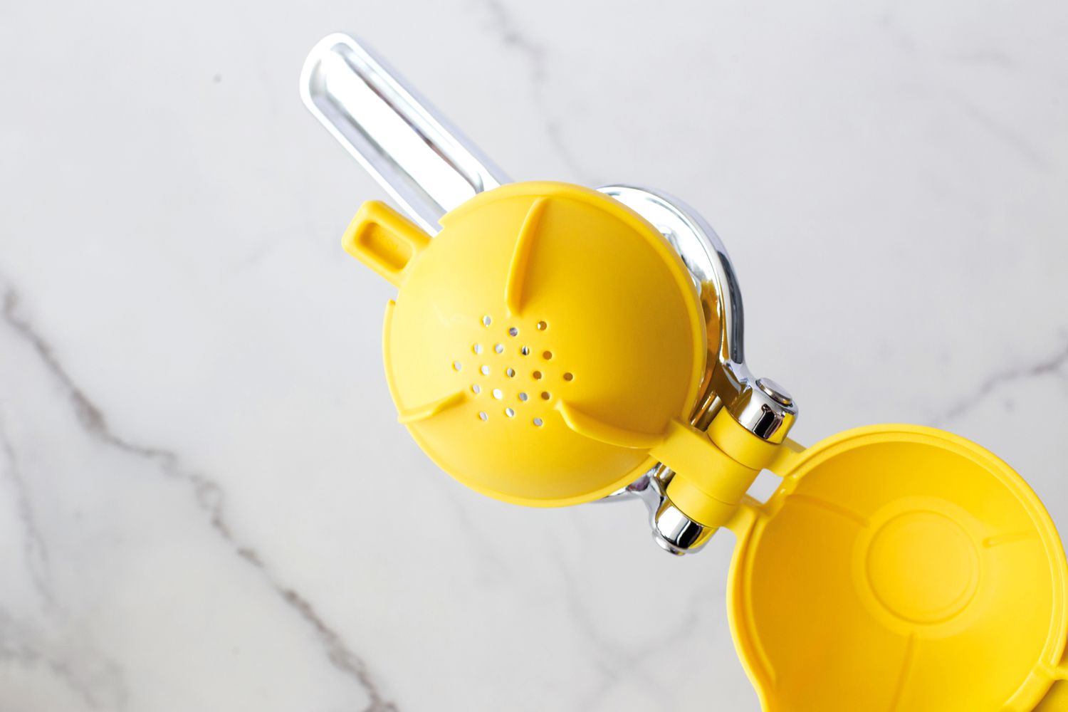 The KitchenAid citrus juicer's juicing cup.