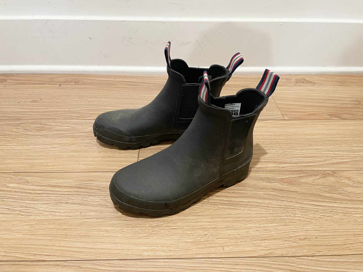 A pair of black Seavees boots.