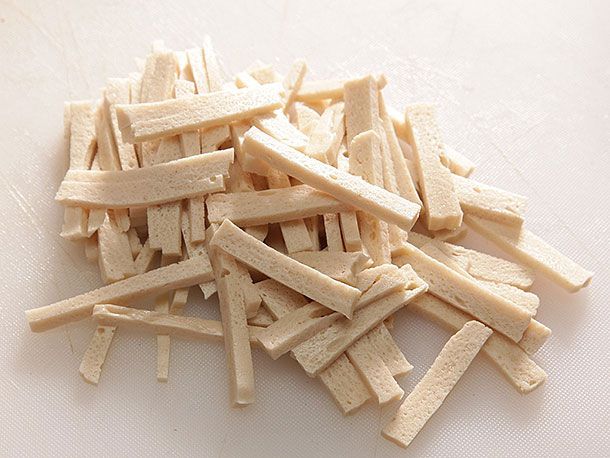 Julienned strips of extra-firm tofu.