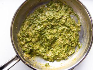 Overhead of pan filled with creamed shishito pepper sauce.