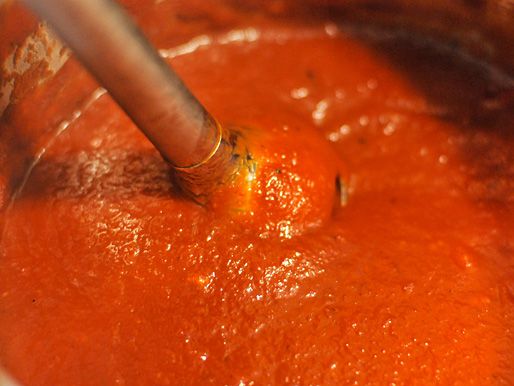 An immersion blender is used to purée the sauce.