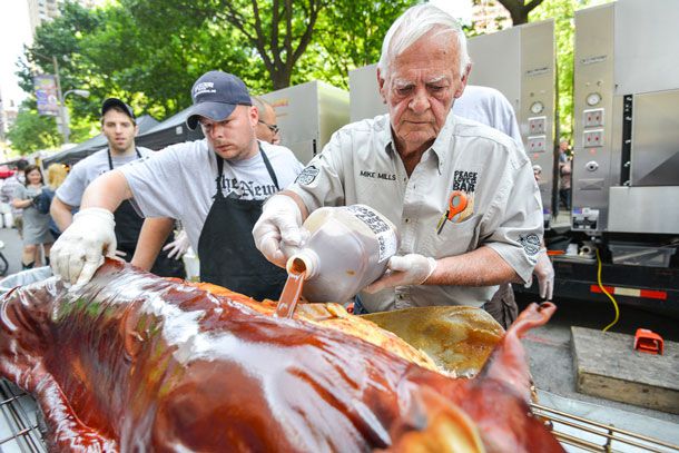 20140608-294993-bbq-block-party-2014-saucing-the-hog.jpg