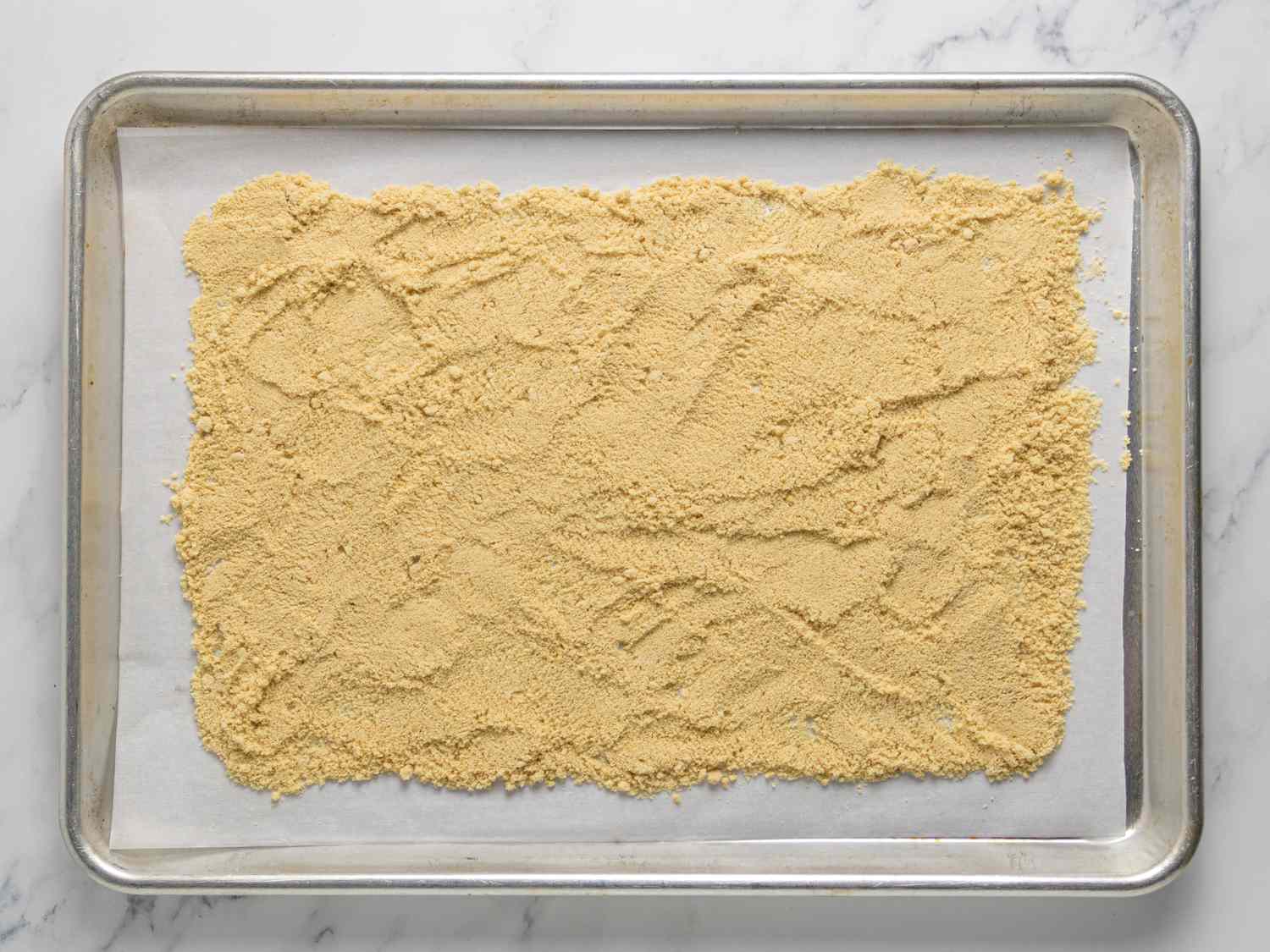 toasted almond flour on sheetpan