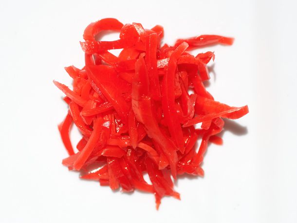 Bright red slivers of Japanese pickled ginger. 