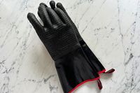 A pair of Grill Armor Gloves BBQ Waterproof Gloves on a kitchen countertop