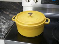 staub dutch oven on stove