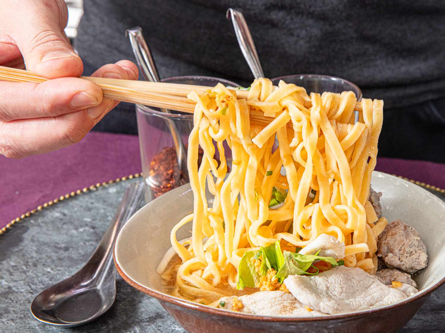 Side view of lifting noodles 