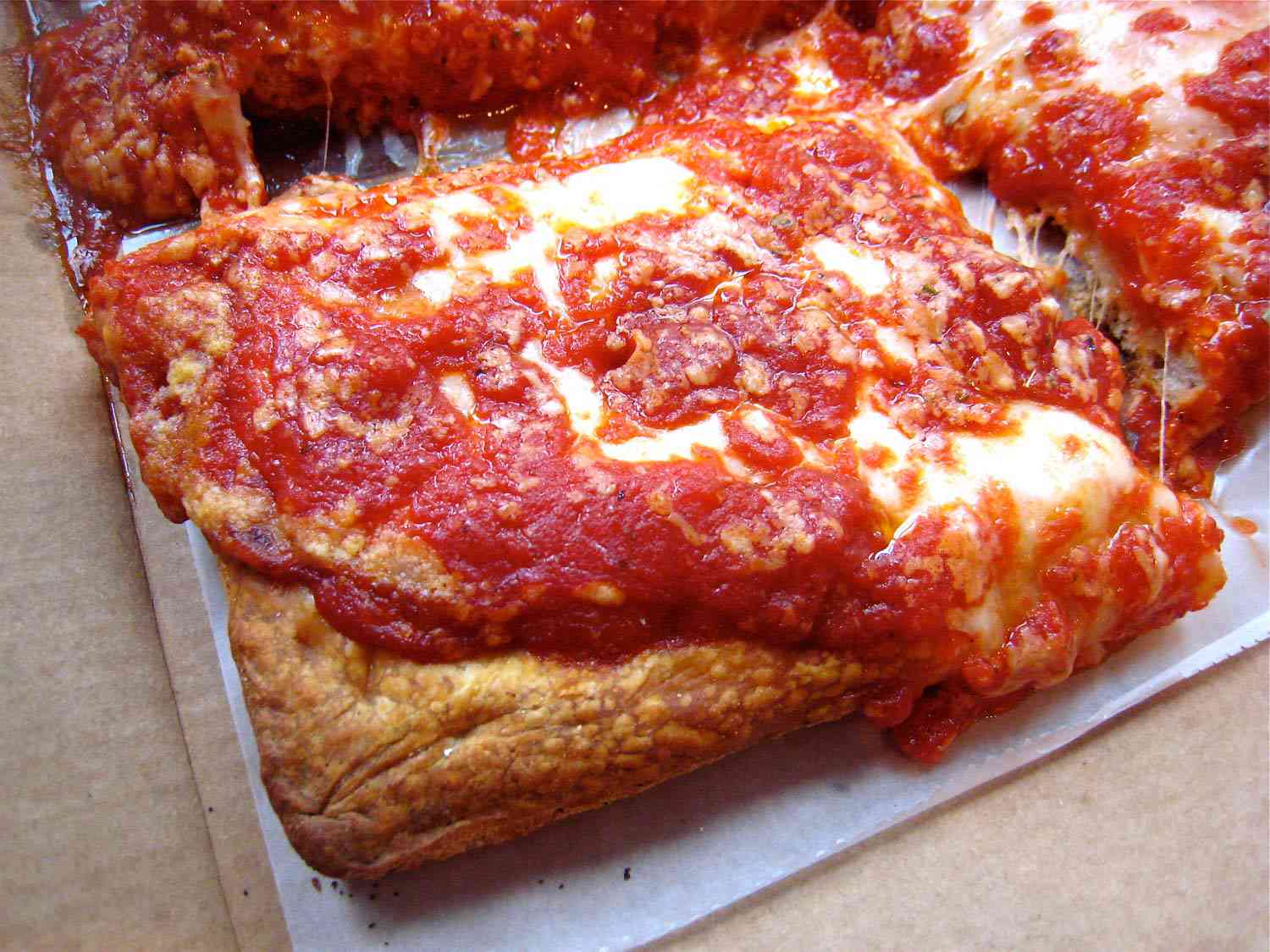 A square slice from NY Pizza Suprema