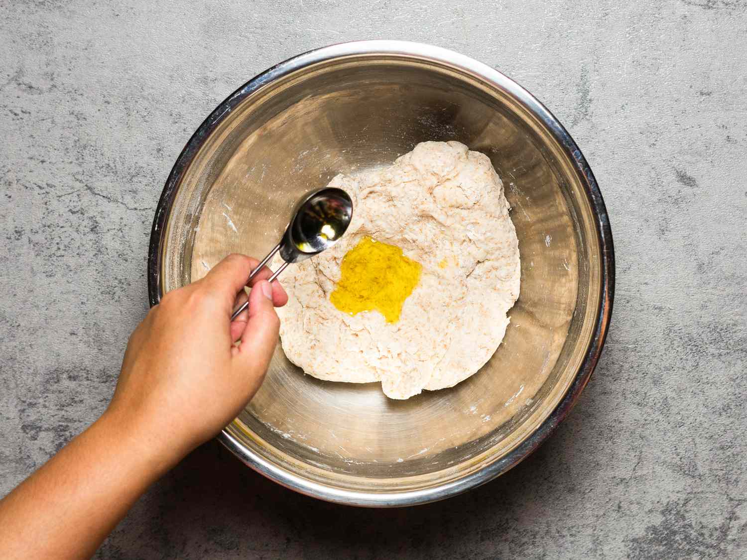 Overhead view of adding oil