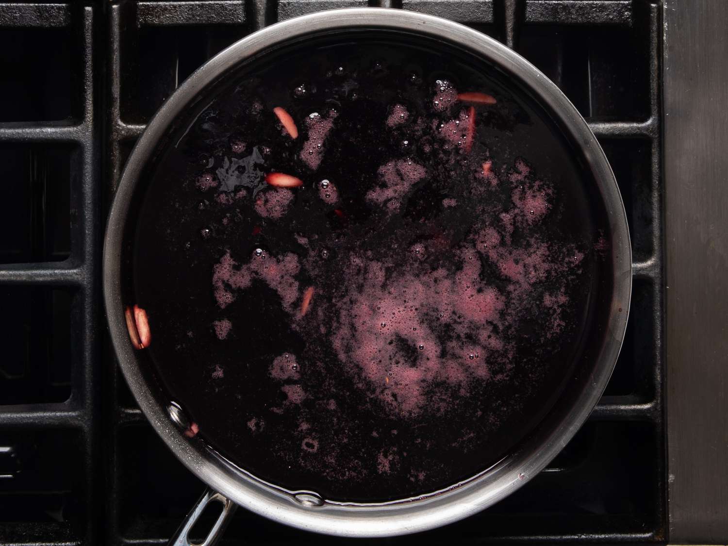 The glogg in a pot; you can see the almonds floating in it.