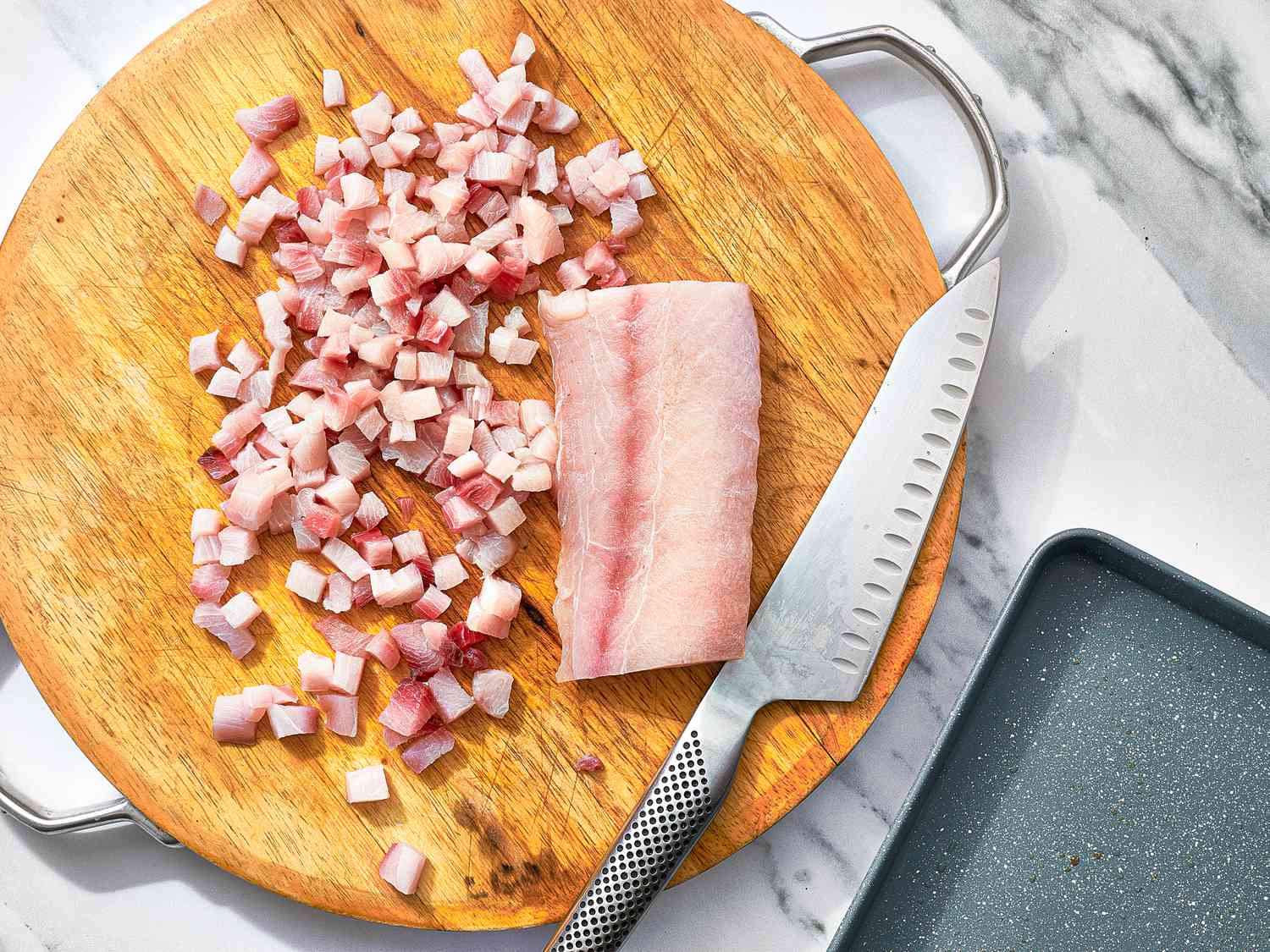 Overhead view of fish on cutting board