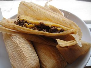 Four Mississippi Delta hot tamales on a plate. 