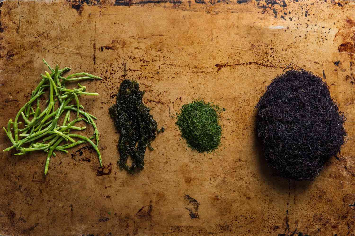 Four unusual seaweeds: sea beans, sea grapes, ao-nori, and ogo-nori.