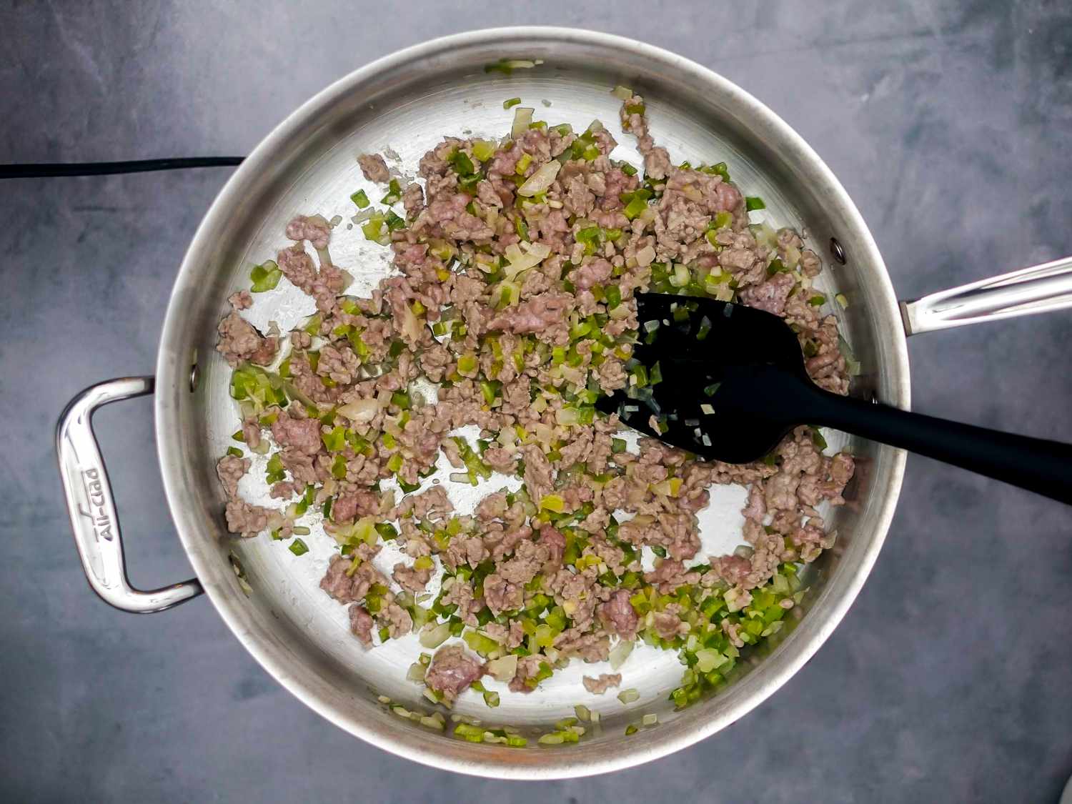 ground beef added to vegetable mixture and lightly browned