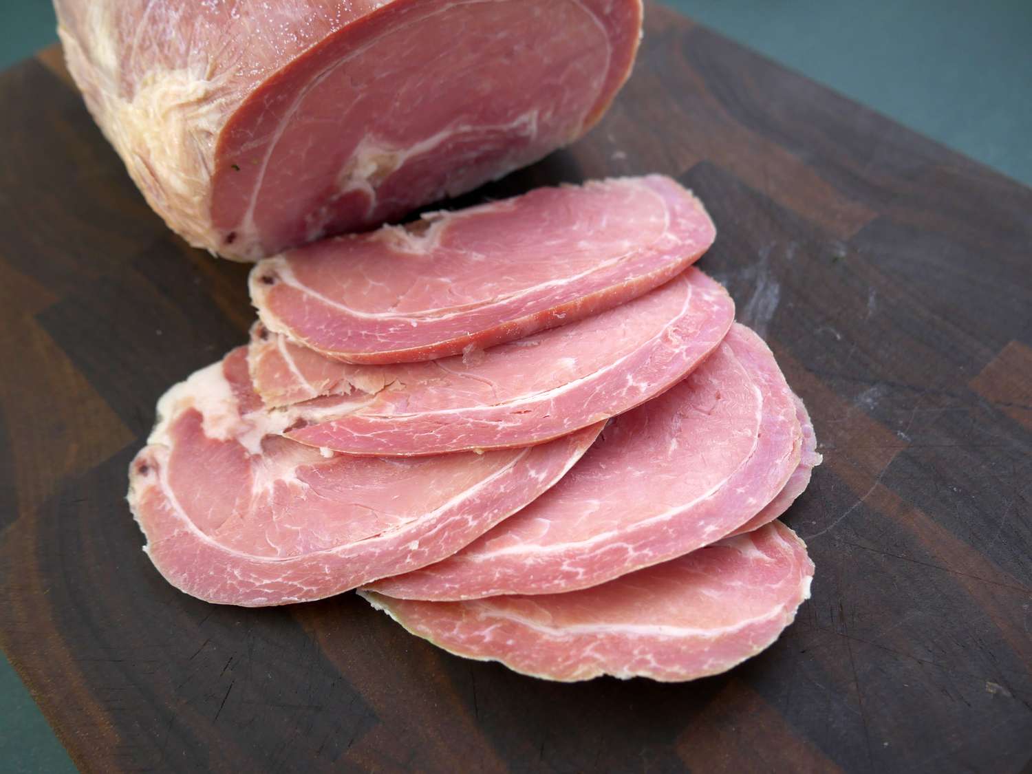 edward's ham sliced on a cutting board