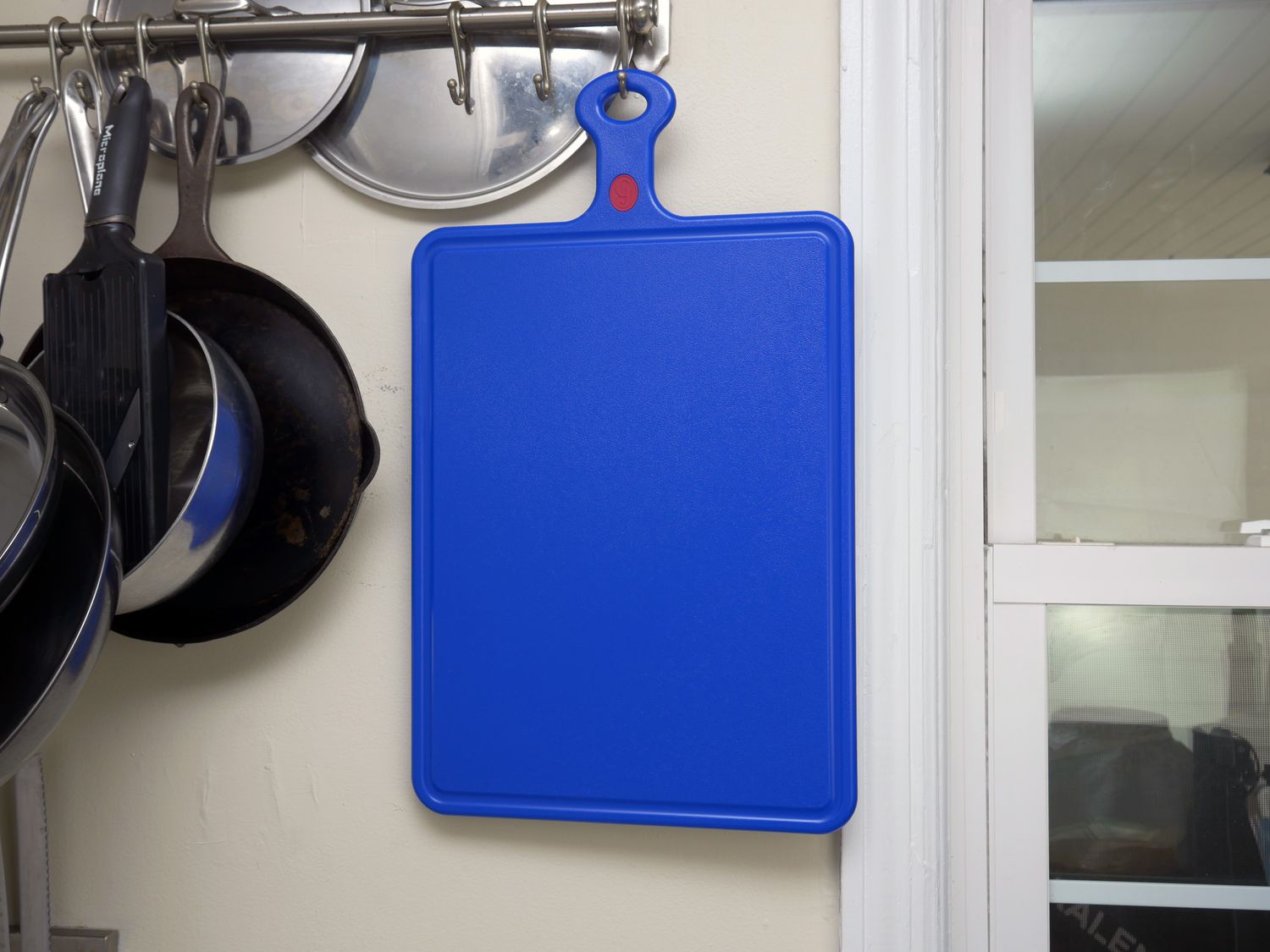 the great jones board hanging on a pan rack