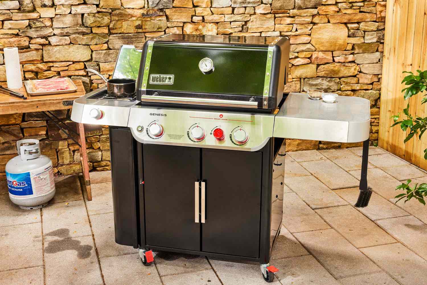 The Weber Genesis E-335 on a patio