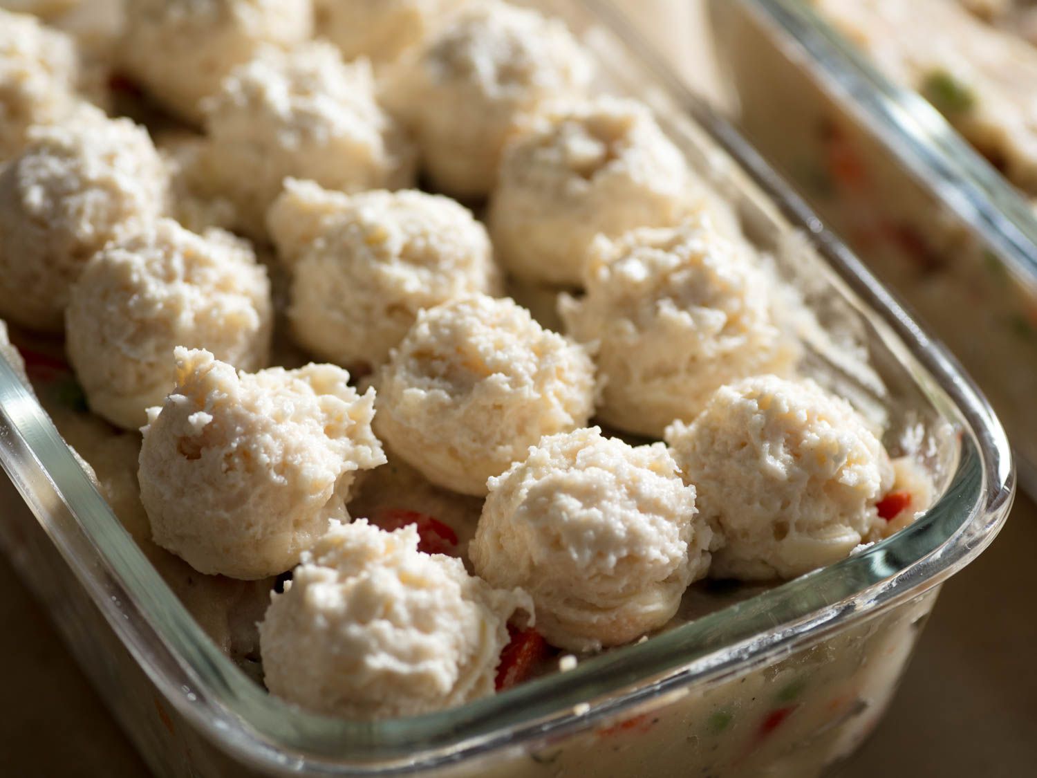 Biscuit-topped chicken pot pie, ready to be baked.