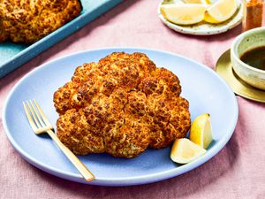 Side view of whole head of roasted cauliflower