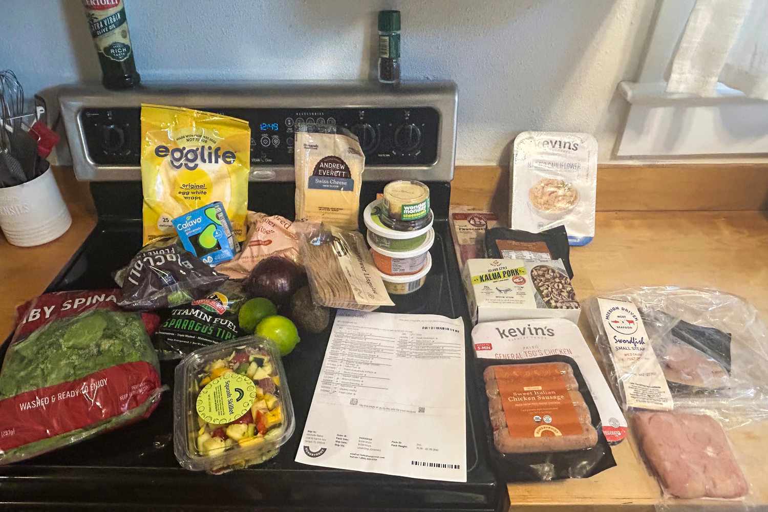 Hungryroot meal ingredients arranged on a kitchen counter