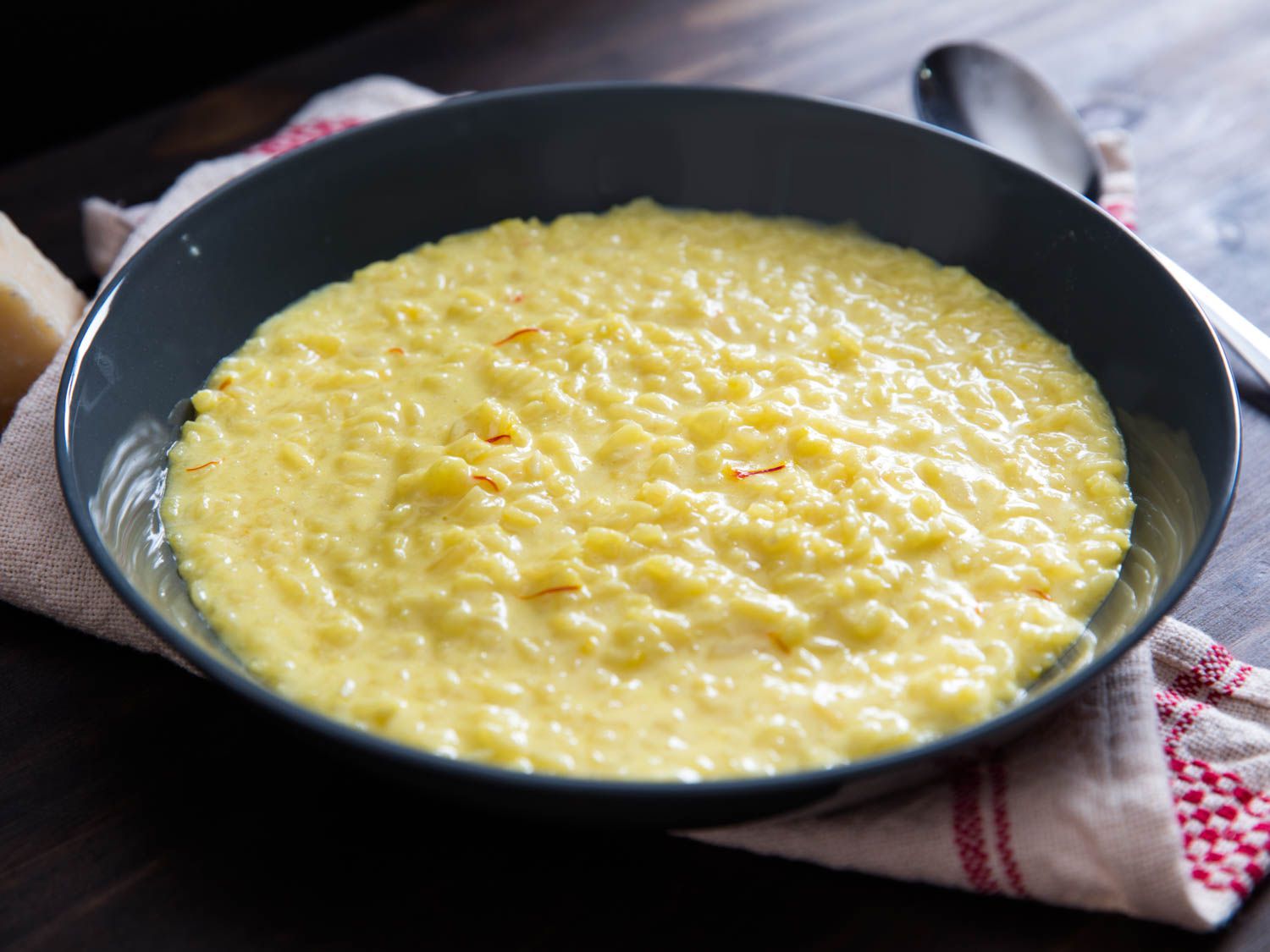 Risotto alla milanese in a serving bowl.
