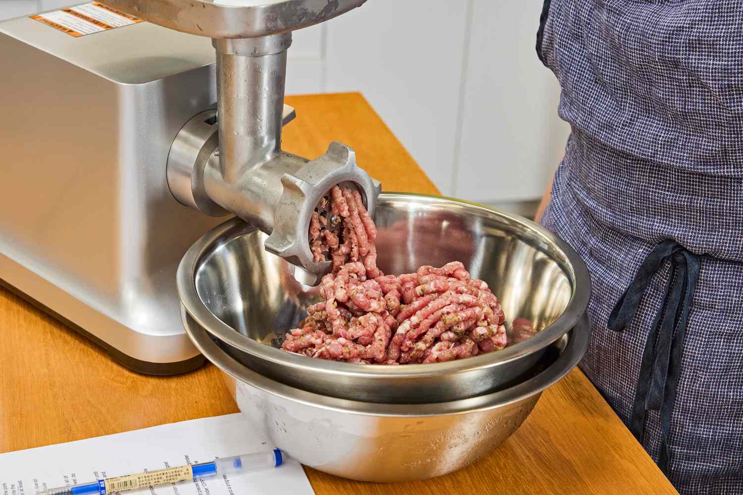 Close-up meat grinding in Weston #12 Electric Meat Grinder & Sausage Stuffer